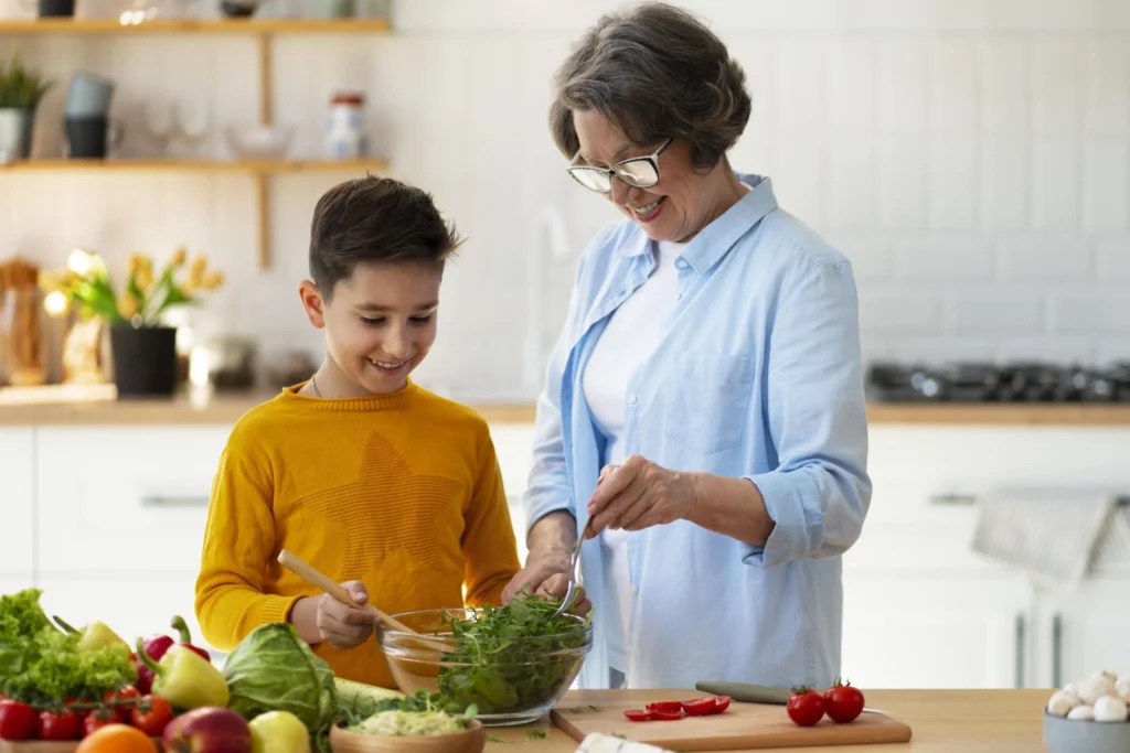 medium shot woman kid cooking together min scaled 1